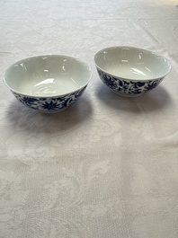 A pair of Chinese blue and white 'lotus scroll' bowls, Yongzheng mark and of the period