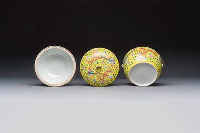 A pair of Chinese famille rose yellow-ground 'Dragon and Phoenix' covered warming bowls and a bowl, Tongzhi marks, 19th C.