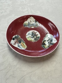 Two Chinese famille rose ruby-ground 'Landscape Scroll' cups and saucers, Yongzheng