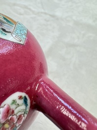 A Chinese famille rose ruby-ground 'Landscape Scroll' teapot and stand, Yongzheng