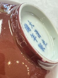 A pair of Chinese copper-red glazed bowls, Guangxu mark and of the period