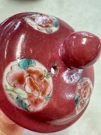 A Chinese famille rose ruby-ground 'Landscape Scroll' teapot and stand, Yongzheng