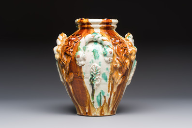 A polychrome Saintonge pottery vase with rope twist handles and mascarons, France, 17th C.