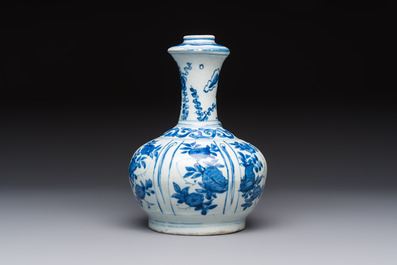 A Chinese blue and white kendi with floral design, Wanli