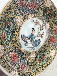 A fine Chinese famille rose gilt-decorated 'Elegant Beauty' cup and saucer, Yongzheng