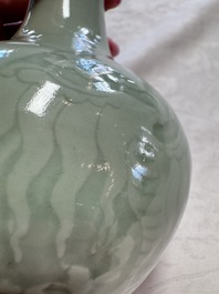 A pair of Chinese celadon-glazed bottle vases with incised phoenix design, Yongzheng mark, 19th C.