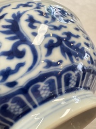 A pair of Chinese blue and white 'lotus scroll' bowls, Yongzheng mark and of the period