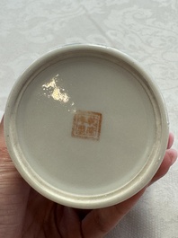A Chinese polychrome brush pot with a bird standing on rockwork amid waves, Qianlong mark, 20th C.