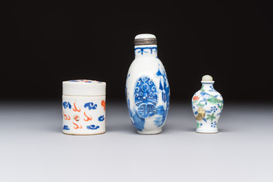 A Chinese iron-red 'Dragon' covered box, a blue and white '100 Boys' and a famille verte 'Fish' snuff bottle, Shunzhi mark, 19th C.