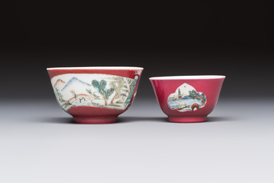 Two Chinese famille rose ruby-ground 'Landscape Scroll' cups and saucers, Yongzheng