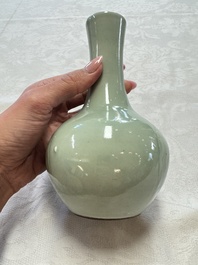 A pair of Chinese celadon-glazed bottle vases with incised phoenix design, Yongzheng mark, 19th C.