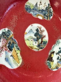 Two Chinese famille rose ruby-ground 'Landscape Scroll' cups and saucers, Yongzheng