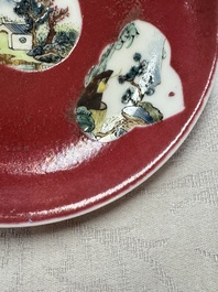Two Chinese famille rose ruby-ground 'Landscape Scroll' cups and saucers, Yongzheng