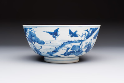 A Chinese blue and white bowl with scholars among cranes and deer, Kangxi mark and of the period