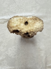 A Chinese carved jade model of a scholar's rock, 20th C.
