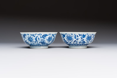 A pair of Chinese blue and white 'lotus scroll' bowls, Yongzheng mark and of the period