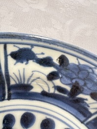 A Japanese Arita blue and white jug and a pair of plates, Edo, 17th C.