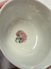 Two Chinese famille rose ruby-ground 'Landscape Scroll' cups and saucers, Yongzheng