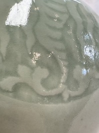 A pair of Chinese celadon-glazed bottle vases with incised phoenix design, Yongzheng mark, 19th C.