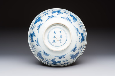 A Chinese blue and white 'Eight Immortals' bowl on a wooden stand, Chenghua mark, late Ming