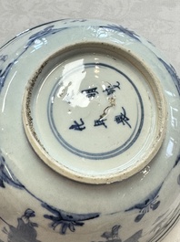 A Chinese blue and white 'Eight Immortals' bowl on a wooden stand, Chenghua mark, late Ming