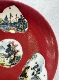 Two Chinese famille rose ruby-ground 'Landscape Scroll' cups and saucers, Yongzheng