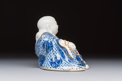 A Chinese blue and white, iron-red and gilt-decorated Milefo Buddha, Fu Jian Hui Guan 福建會館 and You Lin Ji Zhi 游林記製 marks, 20th C.