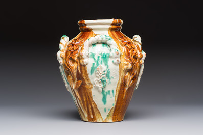 A polychrome Saintonge pottery vase with rope twist handles and mascarons, France, 17th C.