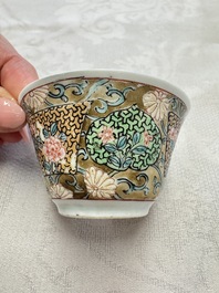 A fine Chinese famille rose gilt-decorated 'Elegant Beauty' cup and saucer, Yongzheng