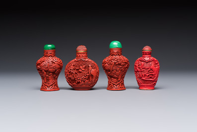 Nine Chinese cinnabar lacquer snuff bottles and a covered box, Qianlong marks, 19/20th C.