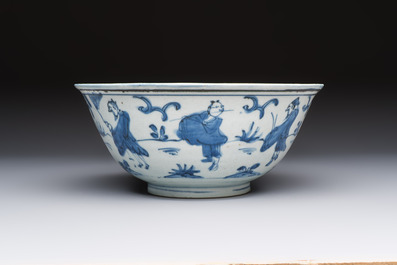 A Chinese blue and white 'Eight Immortals' bowl on a wooden stand, Chenghua mark, late Ming