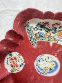 A Chinese famille rose ruby-ground 'Landscape Scroll' teapot and stand, Yongzheng
