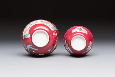Two Chinese famille rose ruby-ground 'Landscape Scroll' cups and saucers, Yongzheng