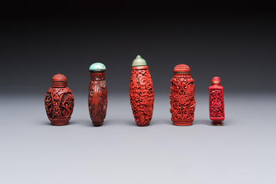 Nine Chinese cinnabar lacquer snuff bottles and a covered box, Qianlong marks, 19/20th C.