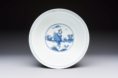 A Chinese blue and white 'Eight Immortals' bowl on a wooden stand, Chenghua mark, late Ming