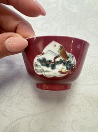 Two Chinese famille rose ruby-ground 'Landscape Scroll' cups and saucers, Yongzheng