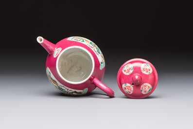A Chinese famille rose ruby-ground 'Landscape Scroll' teapot and stand, Yongzheng