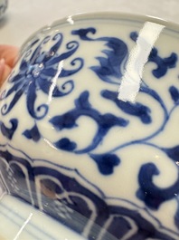 A pair of Chinese blue and white 'lotus scroll' bowls, Yongzheng mark and of the period