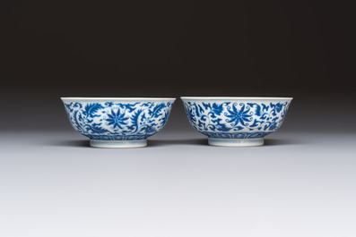 A pair of Chinese blue and white 'lotus scroll' bowls, Yongzheng mark and of the period