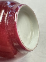 Two Chinese famille rose ruby-ground 'Landscape Scroll' cups and saucers, Yongzheng