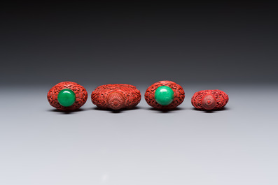 Nine Chinese cinnabar lacquer snuff bottles and a covered box, Qianlong marks, 19/20th C.