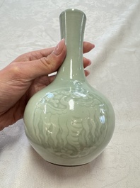 A pair of Chinese celadon-glazed bottle vases with incised phoenix design, Yongzheng mark, 19th C.