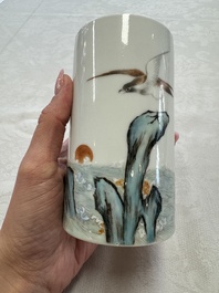 A Chinese polychrome brush pot with a bird standing on rockwork amid waves, Qianlong mark, 20th C.