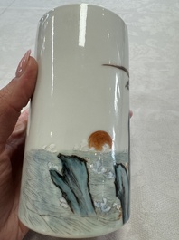 A Chinese polychrome brush pot with a bird standing on rockwork amid waves, Qianlong mark, 20th C.