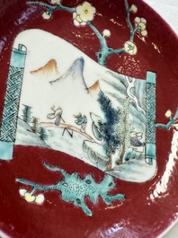 Two Chinese famille rose ruby-ground 'Landscape Scroll' cups and saucers, Yongzheng