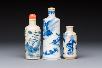 Three Chinese blue and white snuff bottles with landscapes and 'Buddhist Lions', Yongzheng marks, 19th C.