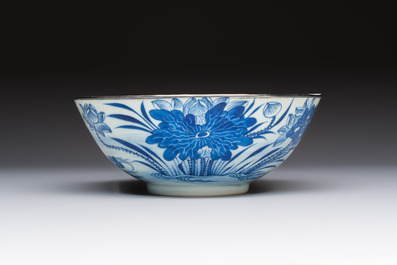 A Chinese blue and white 'Bleu de Hue' bowl with mandarin ducks in a lotus pond and a poem, Ngoan Ngoc 玩玉 mark, 19th C.