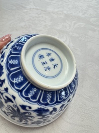 A pair of Chinese blue and white 'lotus scroll' bowls, Yongzheng mark and of the period