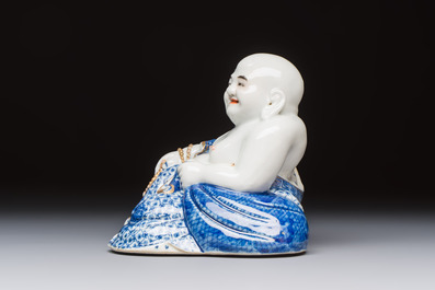 A Chinese blue and white, iron-red and gilt-decorated Milefo Buddha, Fu Jian Hui Guan 福建會館 and You Lin Ji Zhi 游林記製 marks, 20th C.