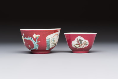 Two Chinese famille rose ruby-ground 'Landscape Scroll' cups and saucers, Yongzheng